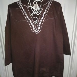 Brown tunic with white detailing